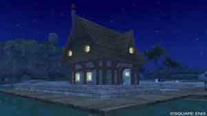 夜の石積みの家